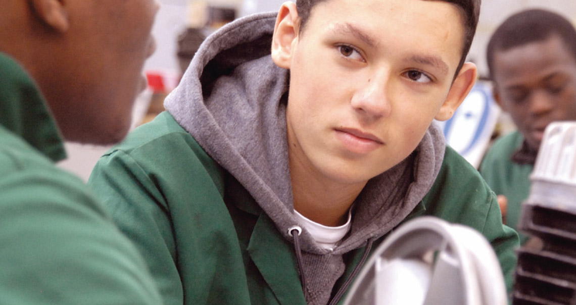Young Male Apprentice Working